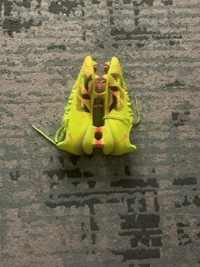 Puma Kids Neon Yellow Soccer Cleats with Pink Accents
